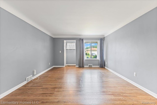 21142 Michael Ct, Saint Clair Shores, MI 48081 - unfurnished room with baseboards and wood finished floors