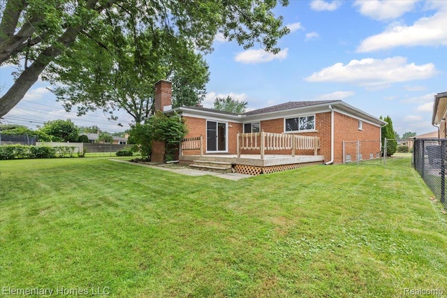 21142 Michael Ct, Saint Clair Shores, MI 48081 - rear view of property with brick siding, a fenced backyard, a chimney, and a wooden deck