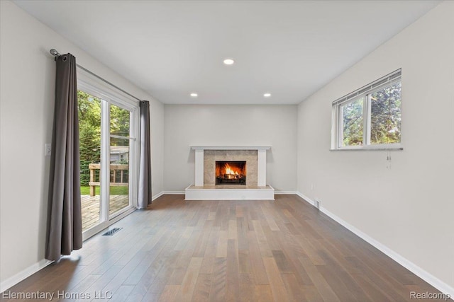 21142 Michael Ct, Saint Clair Shores, MI 48081 - unfurnished living room featuring wood finished floors, a high end fireplace, and recessed lighting