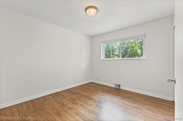 21142 Michael Ct, Saint Clair Shores, MI 48081 - unfurnished room featuring wood finished floors