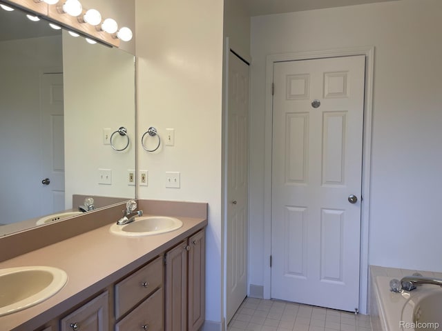 29494 Sylvan Ln Unit 6, Farmington Hills, MI 48334 - full bath with double vanity, tile patterned flooring, and a tub