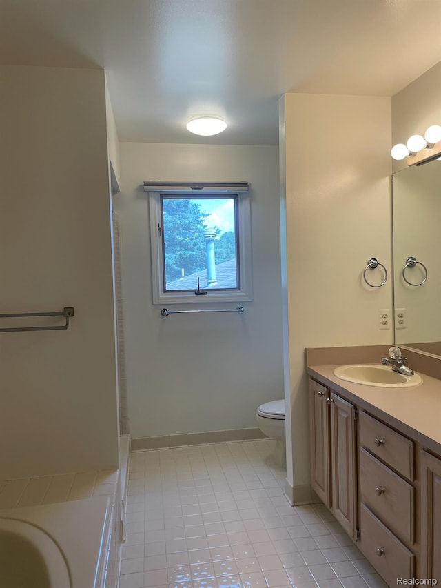 29494 Sylvan Ln Unit 6, Farmington Hills, MI 48334 - bathroom featuring vanity, tile patterned floors, and a tub