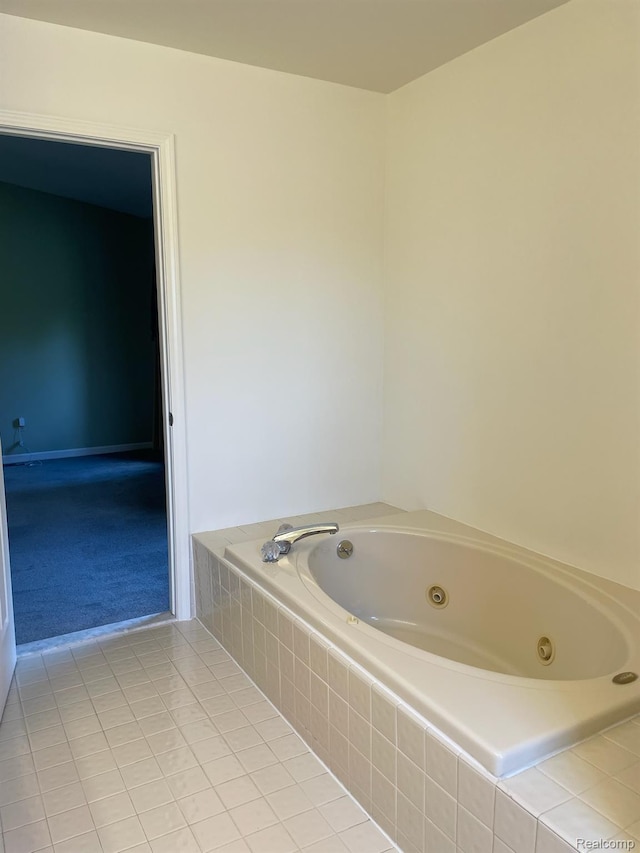 29494 Sylvan Ln Unit 6, Farmington Hills, MI 48334 - bathroom featuring a whirlpool tub and tile patterned flooring