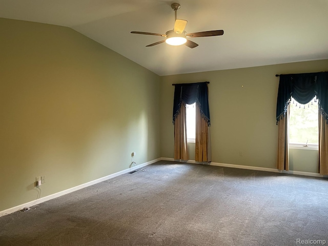 29494 Sylvan Ln Unit 6, Farmington Hills, MI 48334 - empty room with lofted ceiling, a ceiling fan, and carpet floors