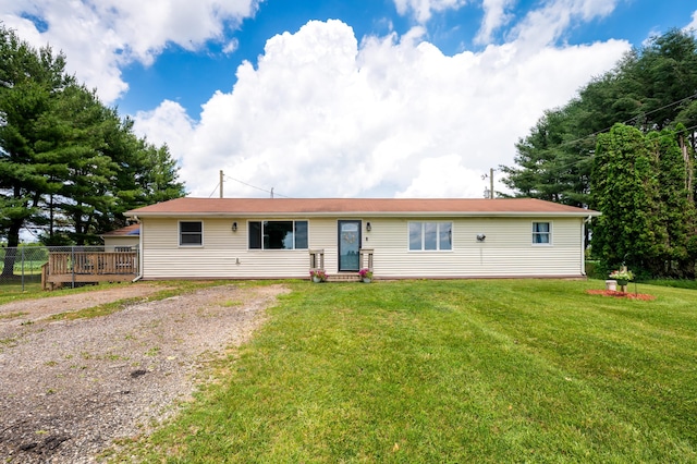 28644 Elm St, Dowagiac, MI 49047 - single story home featuring a front lawn and gravel driveway