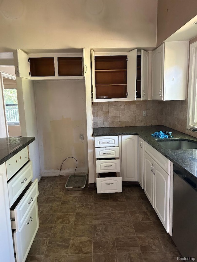 4230 Wendell Rd, West Bloomfield, MI 48323 - kitchen with stainless steel dishwasher, open shelves, dark countertops, and backsplash