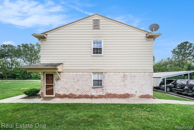 204 Princeton Dr, South Lyon, MI 48178 - view of side of home with a lawn, brick siding, and a detached carport