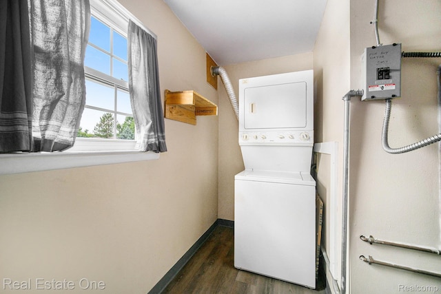 204 Princeton Dr, South Lyon, MI 48178 - washroom with stacked washer / drying machine and dark wood finished floors