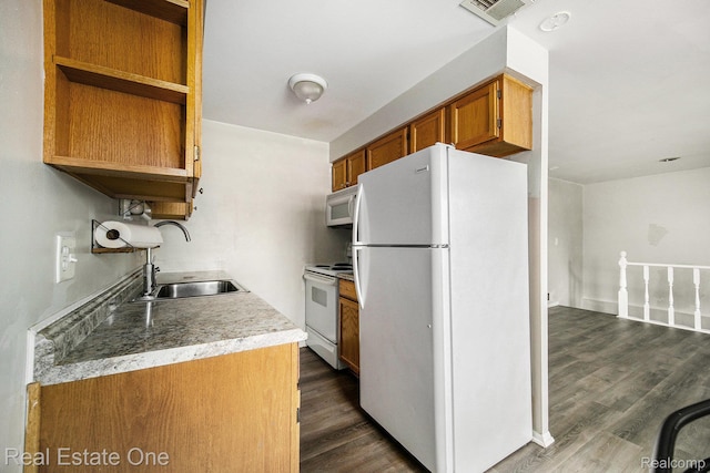 204 Princeton Dr, South Lyon, MI 48178 - kitchen with white appliances, open shelves, brown cabinets, dark wood-style floors, and light countertops