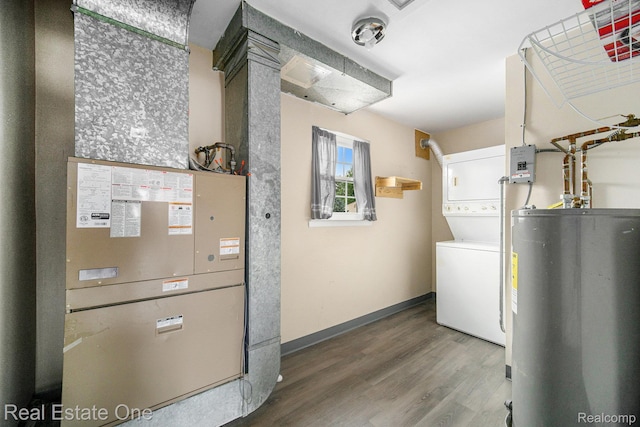 204 Princeton Dr, South Lyon, MI 48178 - utility room featuring water heater, stacked washing machine and dryer, and heating unit