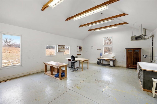 7227 Wheeler Rd, Whitmore Lake, MI 48189 - miscellaneous room featuring beam ceiling, healthy amount of natural light, high vaulted ceiling, and concrete flooring