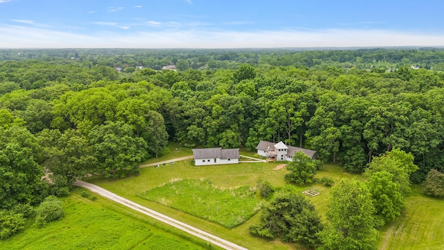 7227 Wheeler Rd, Whitmore Lake, MI 48189 - aerial view of property and surrounding area featuring a heavily wooded area