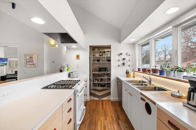 7227 Wheeler Rd, Whitmore Lake, MI 48189 - kitchen featuring white range with gas stovetop, lofted ceiling, light countertops, dark wood-style floors, and recessed lighting