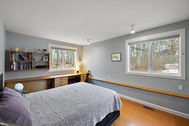 7227 Wheeler Rd, Whitmore Lake, MI 48189 - bedroom with an office area