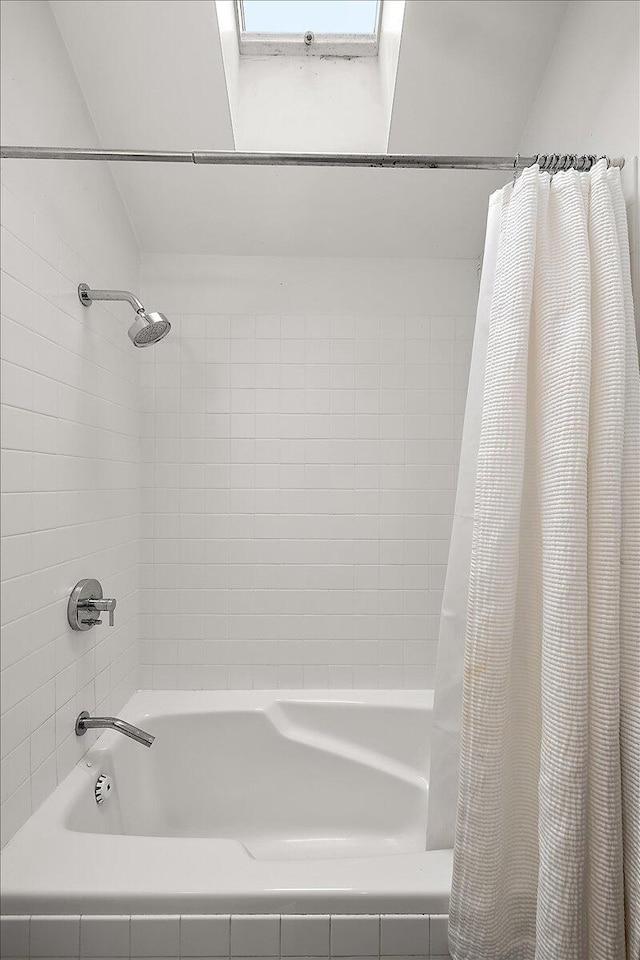 7227 Wheeler Rd, Whitmore Lake, MI 48189 - bathroom with shower / bathtub combination with curtain