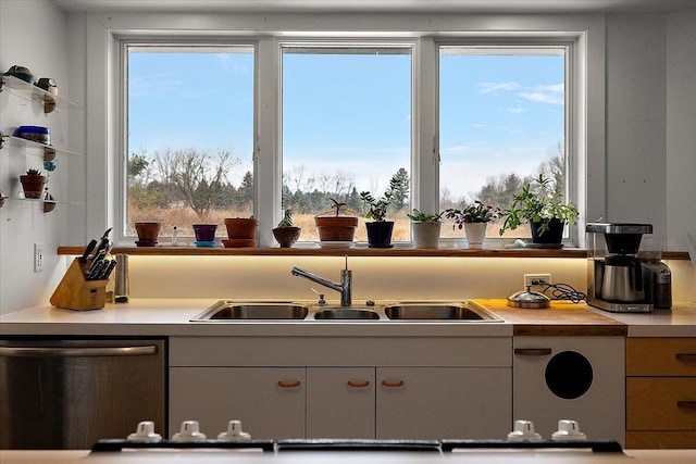 7227 Wheeler Rd, Whitmore Lake, MI 48189 - kitchen with dishwashing machine and light countertops