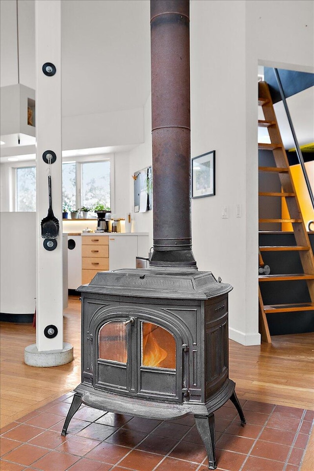 7227 Wheeler Rd, Whitmore Lake, MI 48189 - detailed view of a wood stove and wood finished floors