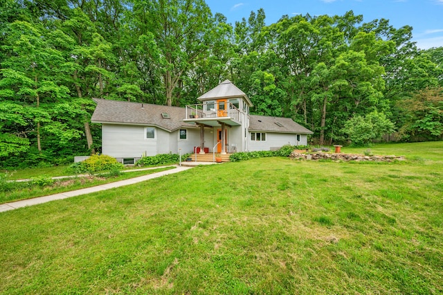 7227 Wheeler Rd, Whitmore Lake, MI 48189 - view of front of property featuring a front yard and a balcony