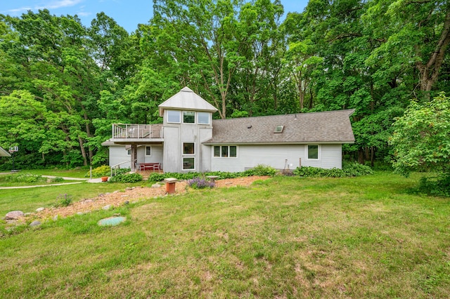 7227 Wheeler Rd, Whitmore Lake, MI 48189 - view of front of property featuring a front lawn and a deck
