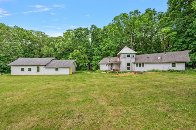 7227 Wheeler Rd, Whitmore Lake, MI 48189 - view of grassy yard featuring a balcony