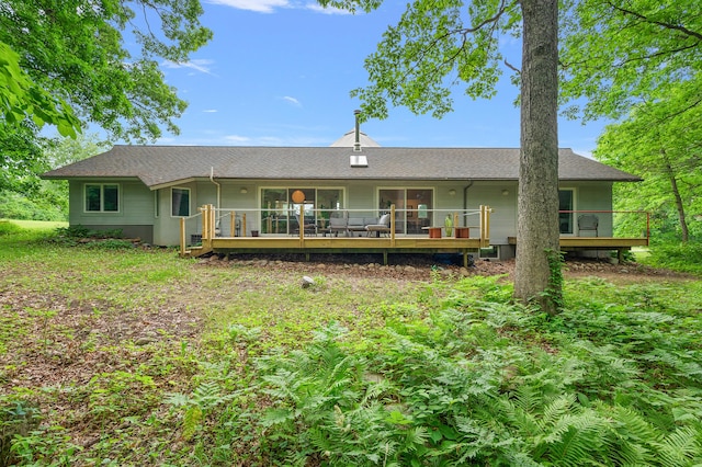 7227 Wheeler Rd, Whitmore Lake, MI 48189 - rear view of property with a wooden deck and a shingled roof