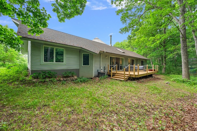 7227 Wheeler Rd, Whitmore Lake, MI 48189 - back of house featuring a wooden deck and a shingled roof