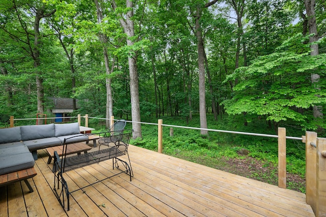 7227 Wheeler Rd, Whitmore Lake, MI 48189 - wooden deck featuring an outdoor hangout area and a wooded view