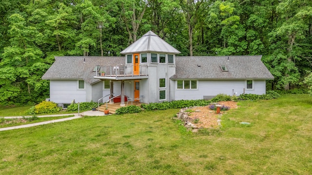 7227 Wheeler Rd, Whitmore Lake, MI 48189 - back of property featuring a yard, a forest view, and a deck