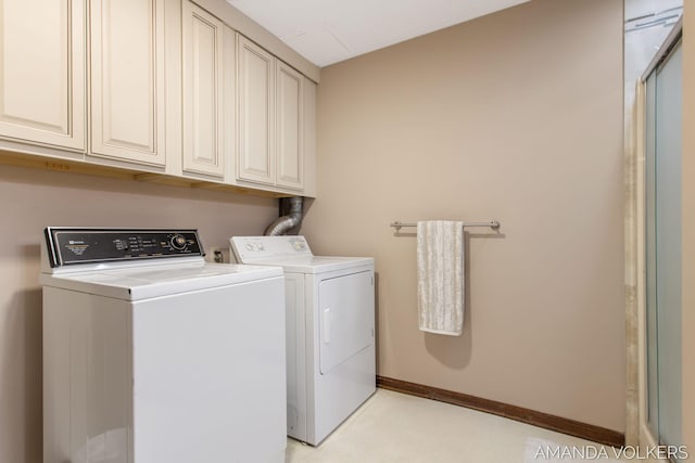 8608 Woodruff Dr SW, Byron Center, MI 49315 - washroom with washing machine and dryer and cabinet space