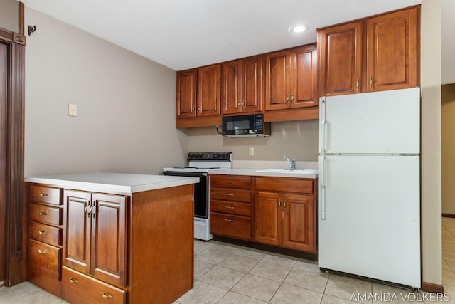 8608 Woodruff Dr SW, Byron Center, MI 49315 - kitchen with white appliances, light countertops, light tile patterned floors, brown cabinets, and recessed lighting