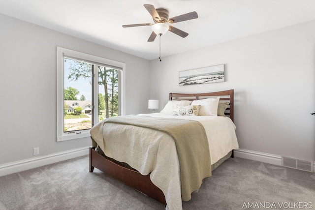 8608 Woodruff Dr SW, Byron Center, MI 49315 - bedroom featuring carpet floors and a ceiling fan