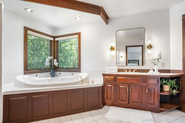 8608 Woodruff Dr SW, Byron Center, MI 49315 - full bathroom featuring vanity, a tub with jets, and tile patterned floors