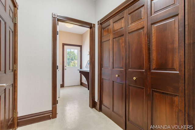 8608 Woodruff Dr SW, Byron Center, MI 49315 - hallway featuring light floors and baseboards