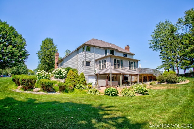 8608 Woodruff Dr SW, Byron Center, MI 49315 - back of house featuring a chimney, a wooden deck, and a yard