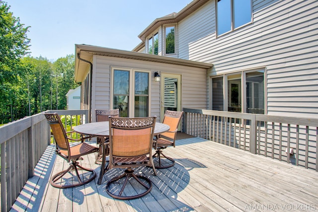 8608 Woodruff Dr SW, Byron Center, MI 49315 - wooden terrace featuring outdoor dining area