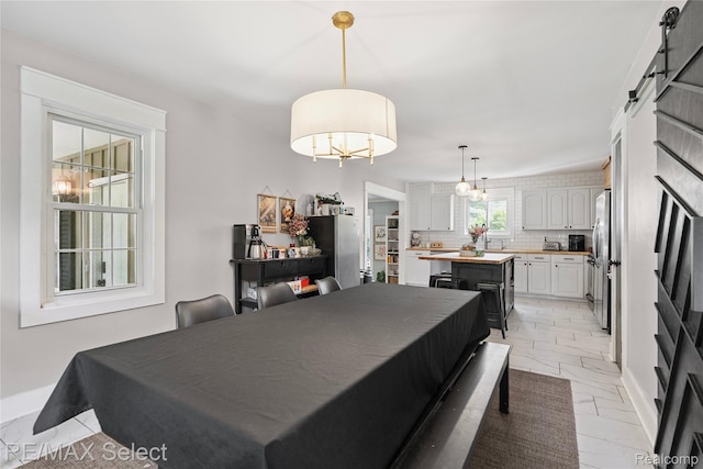 1406 Country View Ln, Flint, MI 48532 - dining room with light marble finish floors