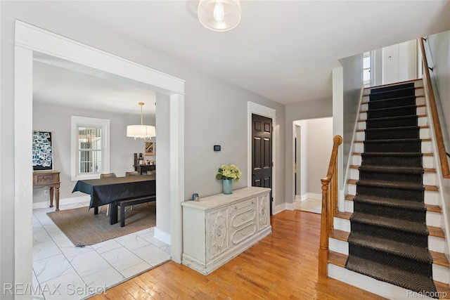 1406 Country View Ln, Flint, MI 48532 - stairway with baseboards and wood finished floors