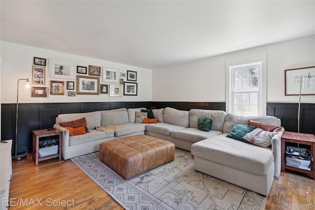 1406 Country View Ln, Flint, MI 48532 - living area featuring wood finished floors and a wainscoted wall