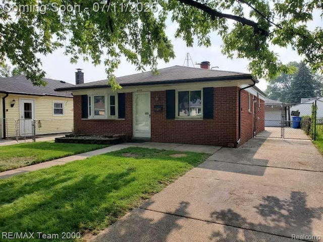 4638 Gertrude St, Dearborn Heights, MI 48125 - view of front of home featuring brick siding, a chimney, and a gate
