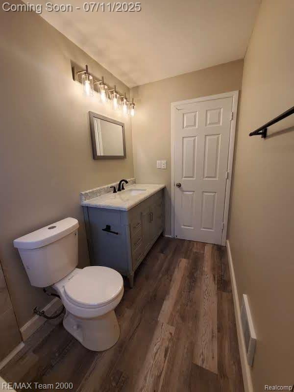 4638 Gertrude St, Dearborn Heights, MI 48125 - bathroom with vanity and wood finished floors