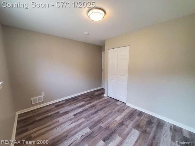 4638 Gertrude St, Dearborn Heights, MI 48125 - unfurnished bedroom with a closet and wood finished floors
