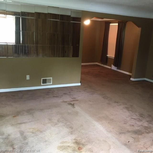7170 Kempa Ave, Romulus, MI 48174 - empty room with baseboards and carpet floors