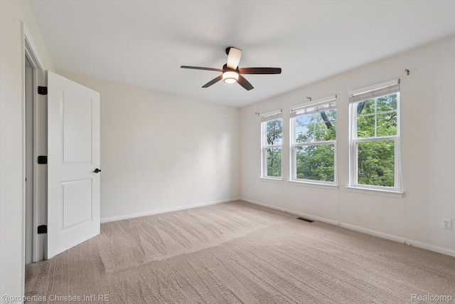 1051 N Sherman Dr Unit B19, Royal Oak, MI 48067 - carpeted empty room with a ceiling fan and baseboards