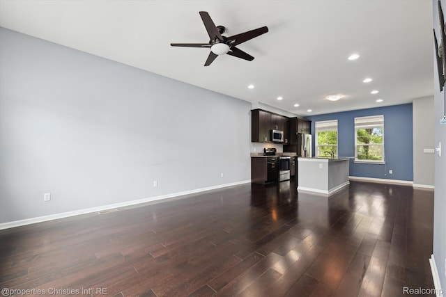 1051 N Sherman Dr Unit B19, Royal Oak, MI 48067 - unfurnished living room featuring ceiling fan, dark wood finished floors, and recessed lighting