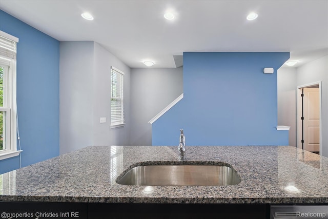 1051 N Sherman Dr Unit B19, Royal Oak, MI 48067 - kitchen featuring plenty of natural light, dark stone countertops, recessed lighting, and dishwasher