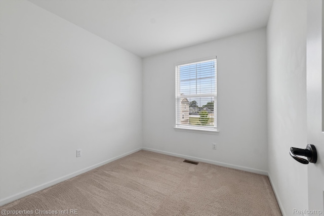 1051 N Sherman Dr Unit B19, Royal Oak, MI 48067 - carpeted spare room with baseboards