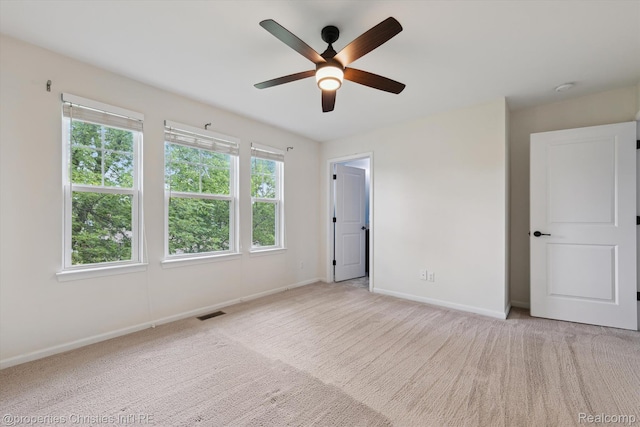 1051 N Sherman Dr Unit B19, Royal Oak, MI 48067 - unfurnished bedroom featuring carpet floors and ceiling fan