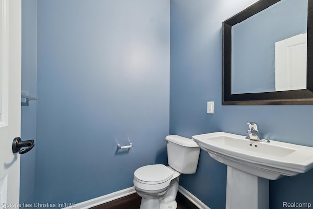 1051 N Sherman Dr Unit B19, Royal Oak, MI 48067 - half bath with toilet and wood finished floors