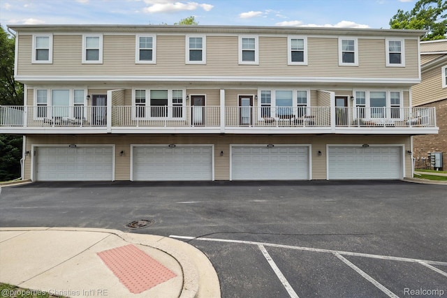 1051 N Sherman Dr Unit B19, Royal Oak, MI 48067 - view of front of house featuring a garage