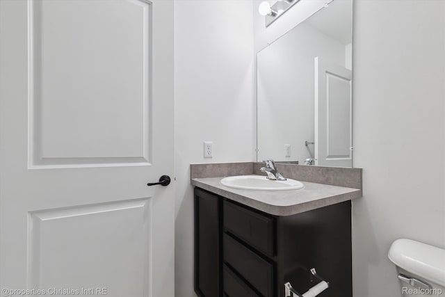 1051 N Sherman Dr Unit B19, Royal Oak, MI 48067 - bathroom featuring vanity and toilet